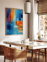 Abstract art print with bold blue, orange, and pink brushstrokes creating layered textures, in a styled room mockup