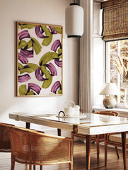 Abstract wall art print with olive green and magenta sweeping brushstrokes on a light background, in a styled room mockup