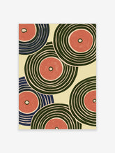 Abstract wall art print with overlapping concentric circles in green, pink, and blue on a cream background