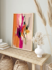 Abstract painting with orange, hot pink, gold, and dark brushstrokes, white lines, and, in an alternate framed mockup