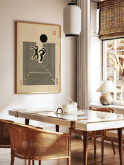 Abstract black figures dancing above concentric lines with a black circle and Japanese text on, in a styled room mockup