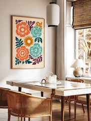 Stylised abstract floral wall art print with orange and teal flowers and a central sun on a beige, in a styled room mockup