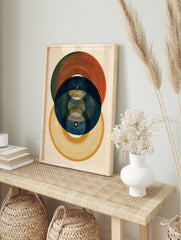 Abstract geometric wall art print featuring overlapping circles in red, blue, and yellow with, in an alternate framed mockup