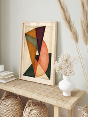 Abstract geometric wall art with overlapping triangles and circular shapes in purple, orange, in an alternate framed mockup