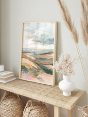 Abstract landscape painting featuring rolling hills and a distant sea under a cloudy sky, in muted pink, orange, green, and blue tones. - Image 3