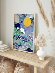Abstract art print with swirling blue ocean waves, green foliage, white clouds, and a large, in an alternate framed mockup
