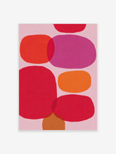 Abstract wall art print with overlapping organic shapes in pink, red, orange, and fuchsia on a pale pink background
