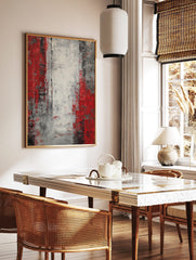 Abstract art print with textured vertical stripes in red, white, grey, and black, portrait, in a styled room mockup