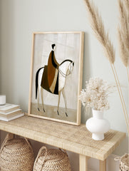 Stylised abstract painting of a rider in brown and black cloak on a white horse, facing right, in an alternate framed mockup