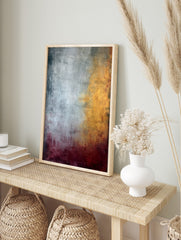 Abstract painting with textured silver, gold, and deep red colour fields blending vertically, in an alternate framed mockup