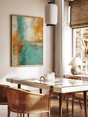 Abstract art print with textured teal, golden yellow, and white colour blocks in a vertical, in a styled room mockup