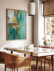 Close-up of peeling teal and gold paint on a textured wall surface with cracks and rough edges, in a styled room mockup