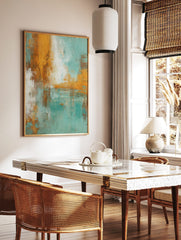 Abstract art print with distressed textures in teal, orange, white, and brown, in a styled room mockup
