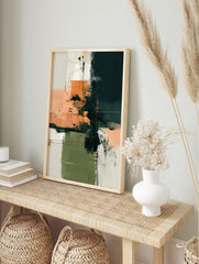Abstract wall art with dark teal, peachy orange, olive green brushstrokes and fine black lines, in an alternate framed mockup