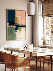 Abstract wall art print with textured navy, peach, olive green, and white brushstrokes and vertical, in a styled room mockup
