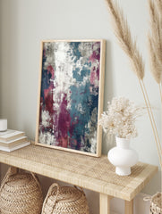 Abstract wall art print with distressed textures in teal, magenta, navy, grey, and white, in an alternate framed mockup