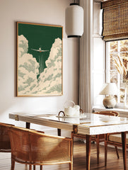 Airplane ascending through textured cream clouds on a deep forest green background, vintage, in a styled room mockup