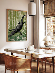 Illustrative linocut style print of a black alligator swimming in a green and white swamp with, in a styled room mockup