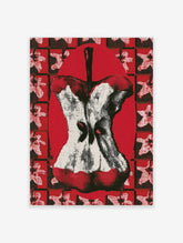 Graphic apple core illustration on a red and black grid background with white floral motifs