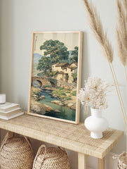 Traditional Asian landscape wall art depicting a Chinese village with a stone bridge over a river, large trees, and mountains. - Image 3