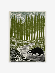 Linocut-style print of a badger walking by a winding river in a forest of tall pine trees and wildflowers