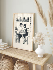 Monochrome illustrative print of a man and woman talking at a bar, with drinks and Japanese, in an alternate framed mockup