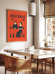 Minimalist bar scene art print with a man and woman in black silhouettes against a red background, in a styled room mockup