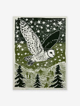 Barn owl flying across a starry night sky above a forest of pine trees, in a green and white linocut style print.