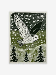 Barn owl flying across a starry night sky above a forest of pine trees, in a green and white linocut style print.