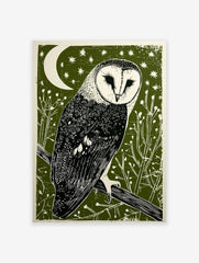 Barn owl linocut print on a dark green background with a white crescent moon, stars, and foliage.