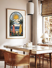 Illustrative beach scene art print with two surfboards, palm trees, ocean, sun, and clouds in an, in a styled room mockup