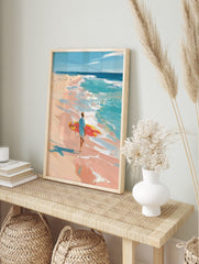 Impressionist painting of a surfer with red and yellow board walking on a peach-toned beach, in an alternate framed mockup
