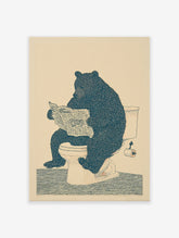 Humorous illustration of a large, dark blue bear sitting on a white toilet, reading a newspaper, on a light beige background.