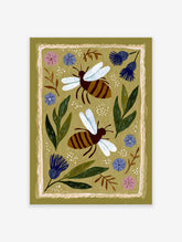 Illustrated bee wall art with two striped bees, green leaves, and blue and pink flowers on an olive green background.