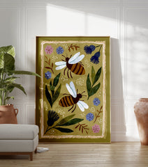 Illustrated bee wall art with two striped bees, green leaves, and blue and pink flowers on an olive green background. - Image 3