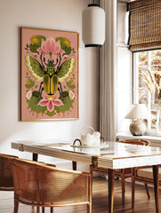 Ornate green and gold beetle with patterned wings, surrounded by pink lotus flowers and green, in a styled room mockup