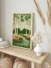 Illustrative print of birch trees, ducks in a river, marsh grass, and flying birds in green, in an alternate framed mockup