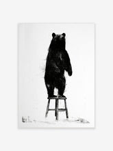 Black bear illustration standing on a wooden stool, monochrome art print on white background