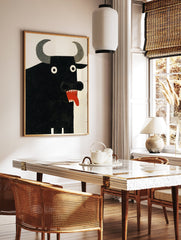 A black bull poster with large grey horns, white eyes, and a red mouth with sharp teeth and tongue against a white background. - Image 2