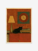 Illustrative art print of a black cat lying on a record player with a lamp and circular wall clock in a warm orange room