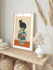 Illustration of a black cat sitting on a blue and white ceramic vase with an orange lotus flower. Black Cat Art Print. - Image 3