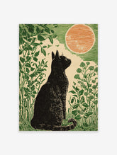 Linocut style art print of a black cat sitting in green foliage, looking at a large orange moon