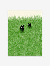 Two black cats with wide eyes peeking out from tall, textured green grass against a cream background, minimalist art.