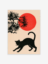 Black cat stretching under a pine branch and a large red sun in a Japanese-style illustrative art print