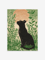 Black cat silhouette in linocut style, sitting in green foliage, looking at orange sunset