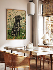 Black shaggy dog in linocut style sitting in a green and orange wildflower meadow art print, in a styled room mockup
