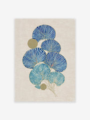 Blue and gold botanical fan leaf wall art print on a textured beige canvas, featuring a cluster of stylized leaves.