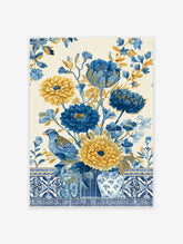 Blue and yellow floral wall art with a bird, decorative vases, and Chinoiserie botanical patterns on a light background.