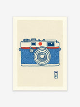 Blue and white vintage camera illustration art print with red accent on textured paper, perfect for photography decor.