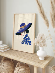 Illustrated Blue Hat Woman Wall Art print, profile view, wearing a wide-brimmed blue hat with tan ribbon and patterned blue top - Image 3